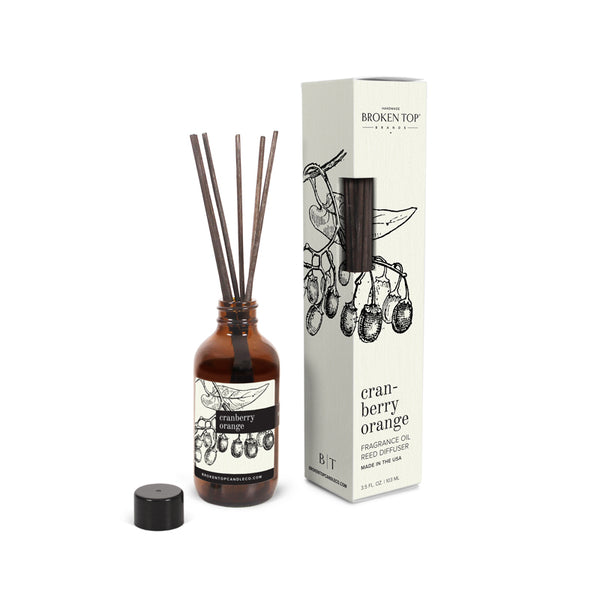 Cranberry Orange Reed Diffuser on white background.