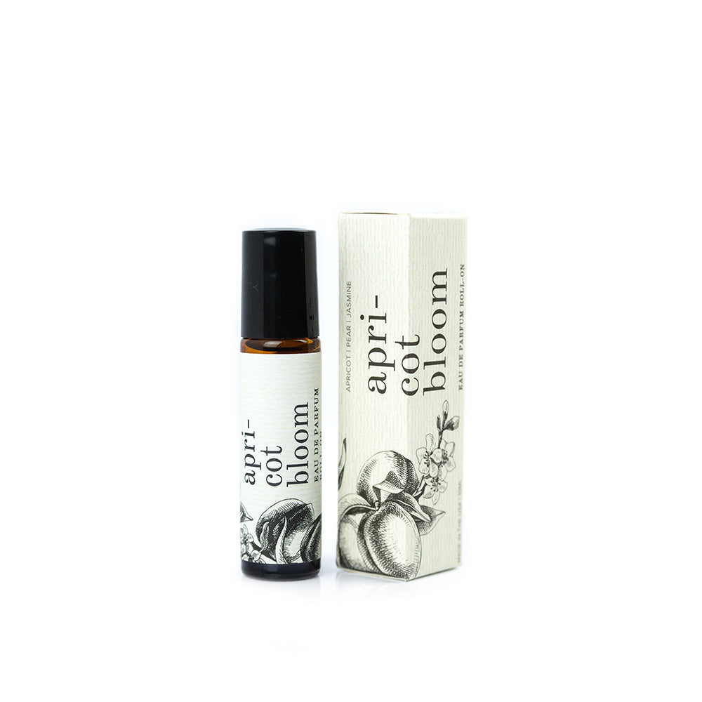 Apricot Bloom Roll-On Perfume on white background. 