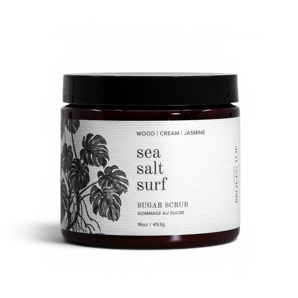 A jar of Sea Salt Surf Sugar Scrub on a white background. 