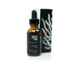 1oz Black Coral Tide Beard Oil on white background. 