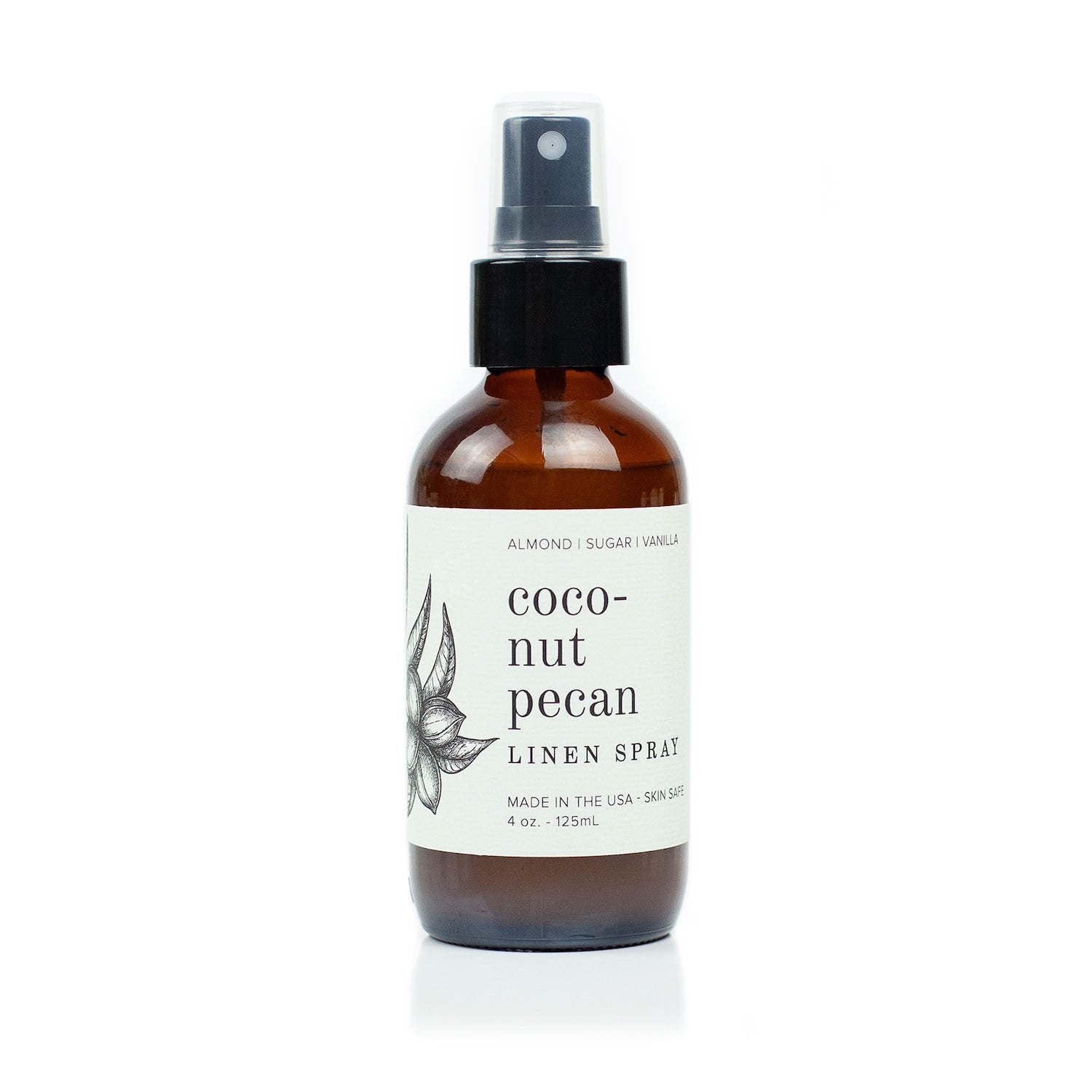 4oz Coconut Pecan Linen Spray on white background. 