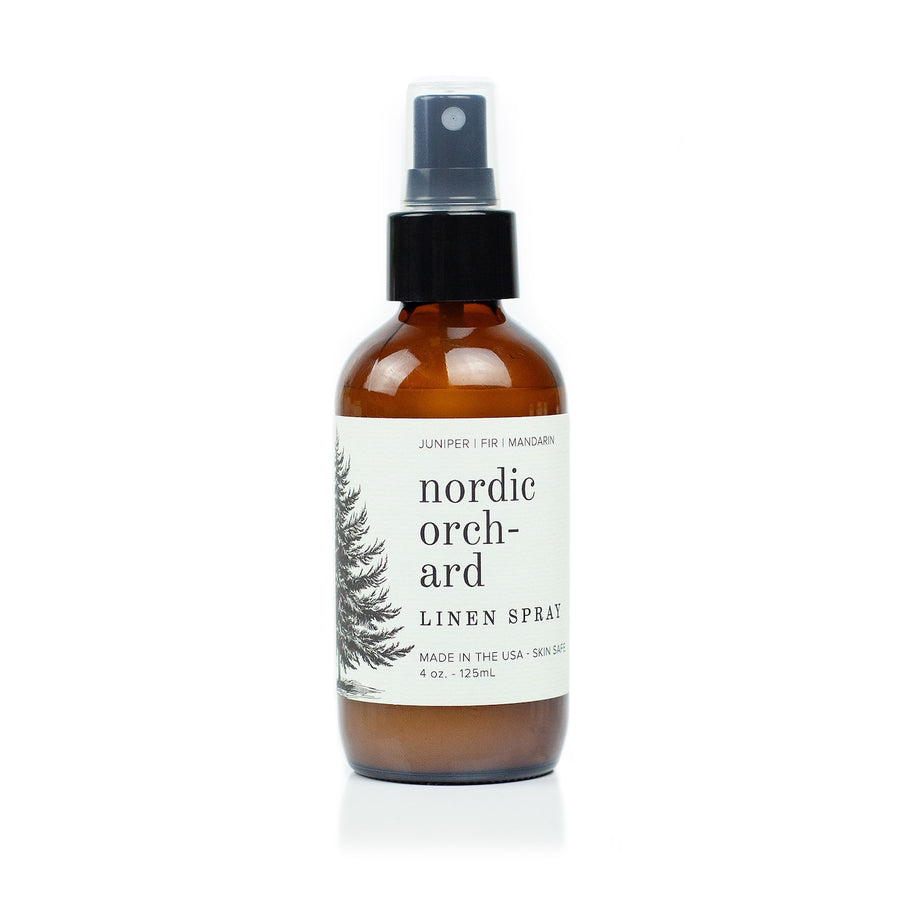 4oz Nordic Orchard Linen Spray on white background. 