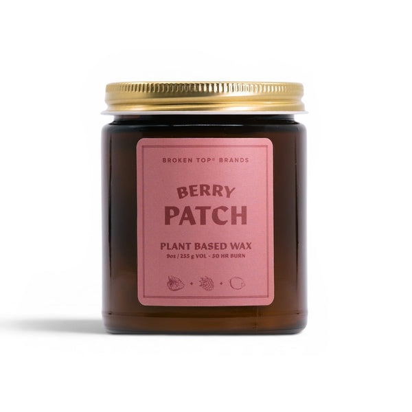 Candle jar labeled 'Berry Patch' with a pink label on a white background