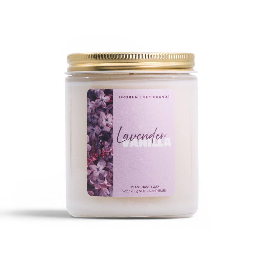 Candle jar with lavender vanilla label on a white background