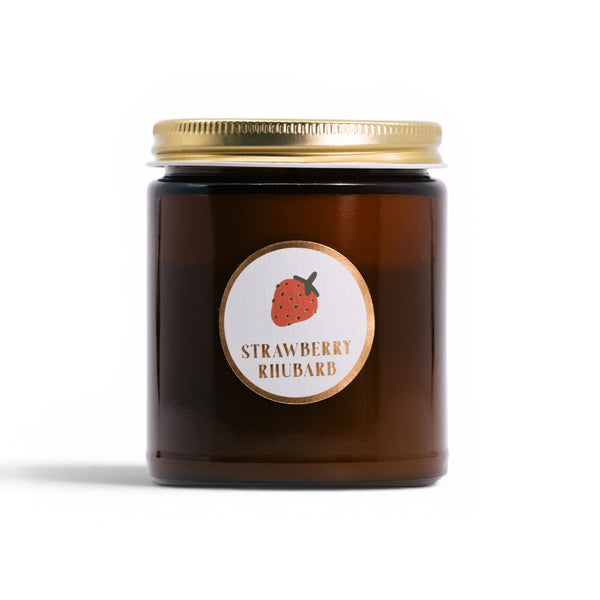 Brown jar with gold lid and 'Strawberry Rhubarb' label on a white background