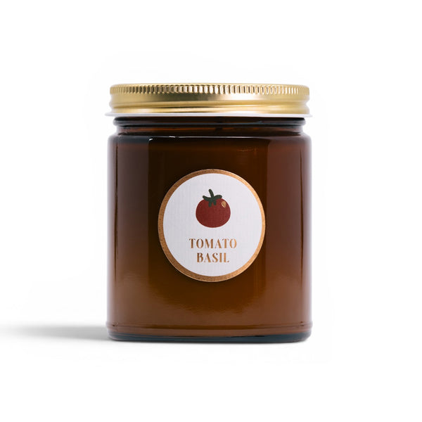 Tomato Basil jar candle with a gold lid on a white background
