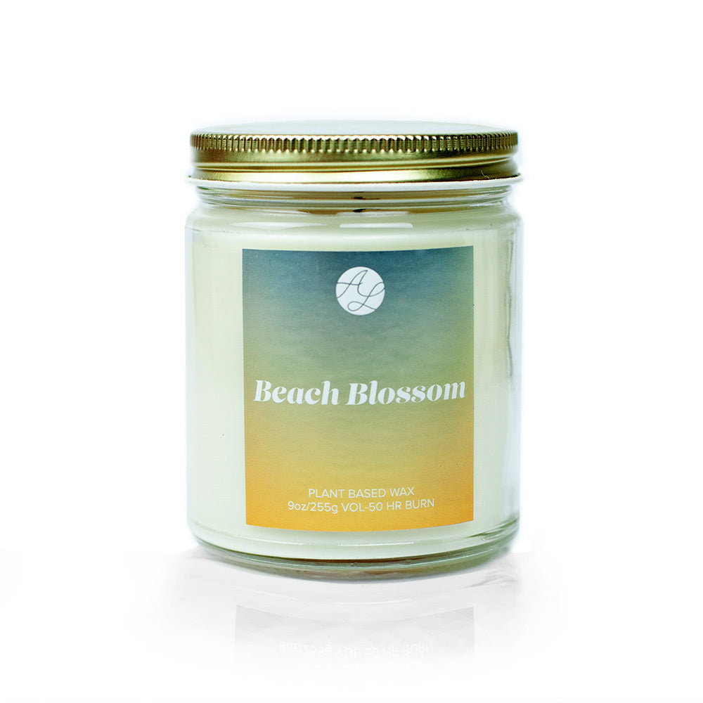 9oz Austy Lou Beach Blossom Soy Candle on white background. 
