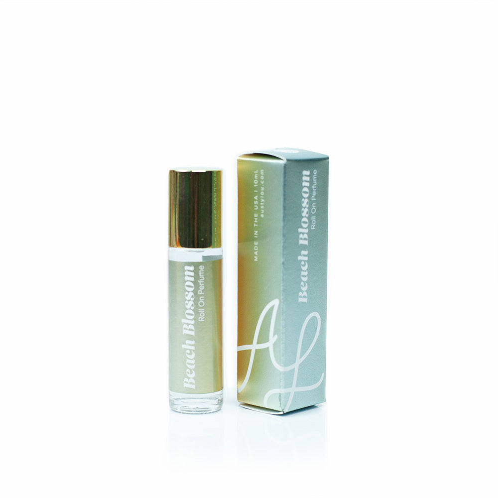 Austy Lou Beach Blossom Roll-On Perfume on white background. 