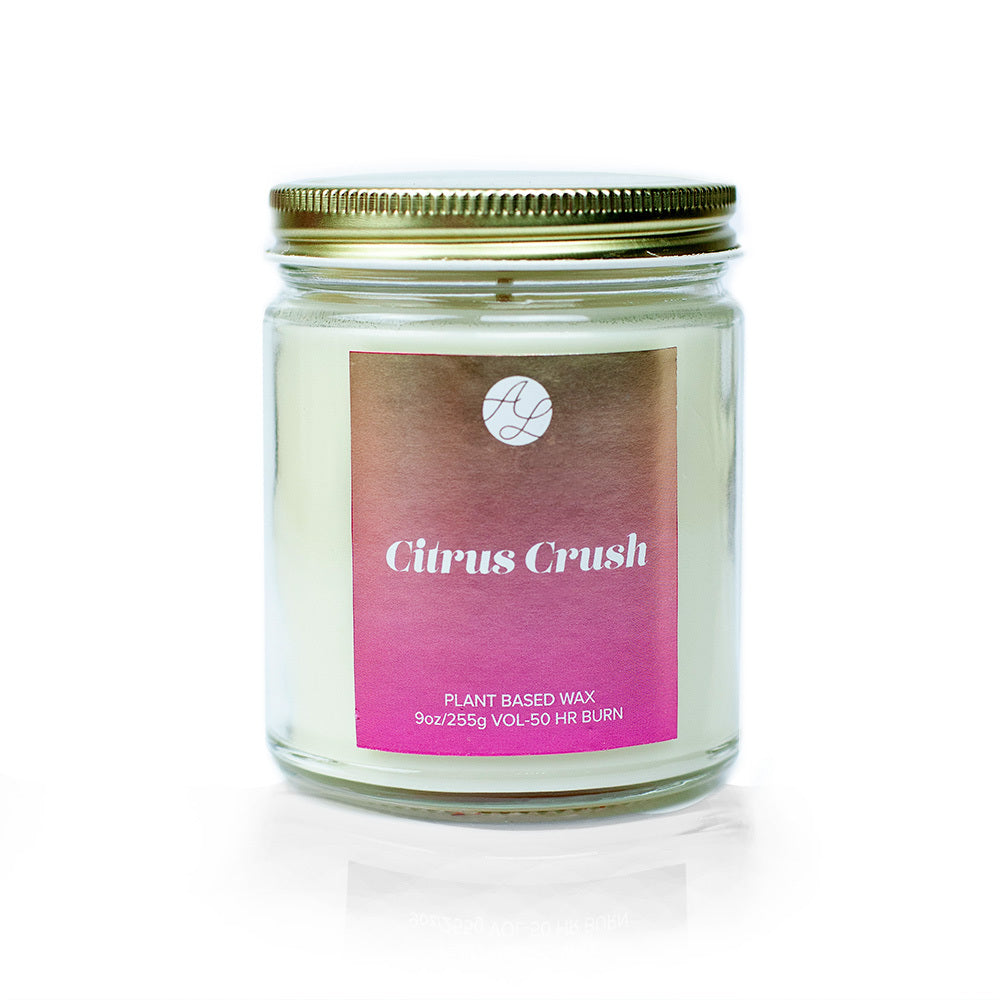 9oz Austy Lou Citrus Crush Soy Candle on white background. 