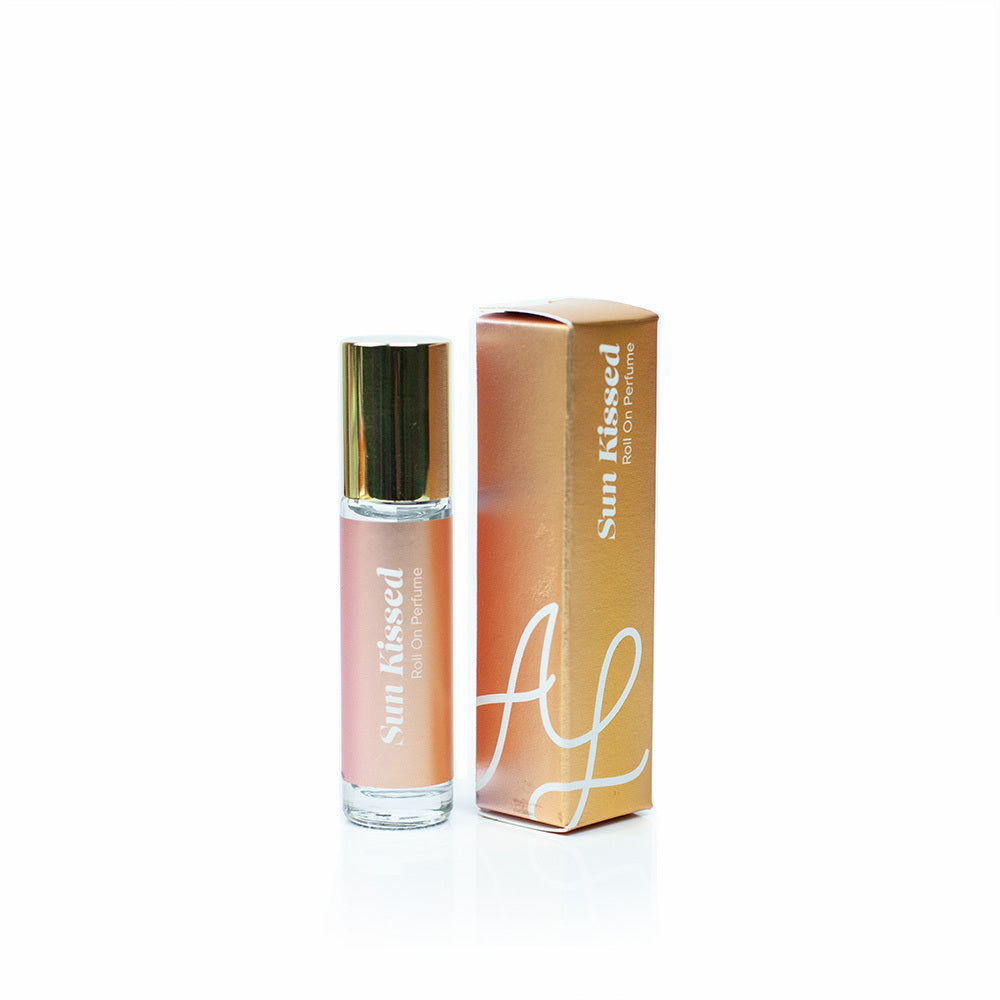 Austy Lou Sun Kissed Roll-On Perfume on white background. 