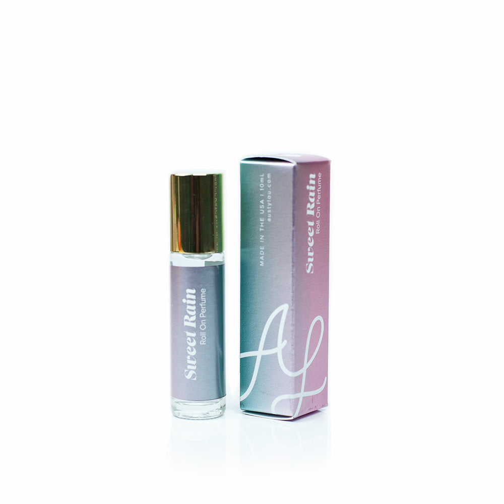 Austy Lou Sweet Rain Roll-On Perfume on white background. 