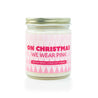 'On Christmas We Wear Pink' 9oz Soy Candle on white background. 