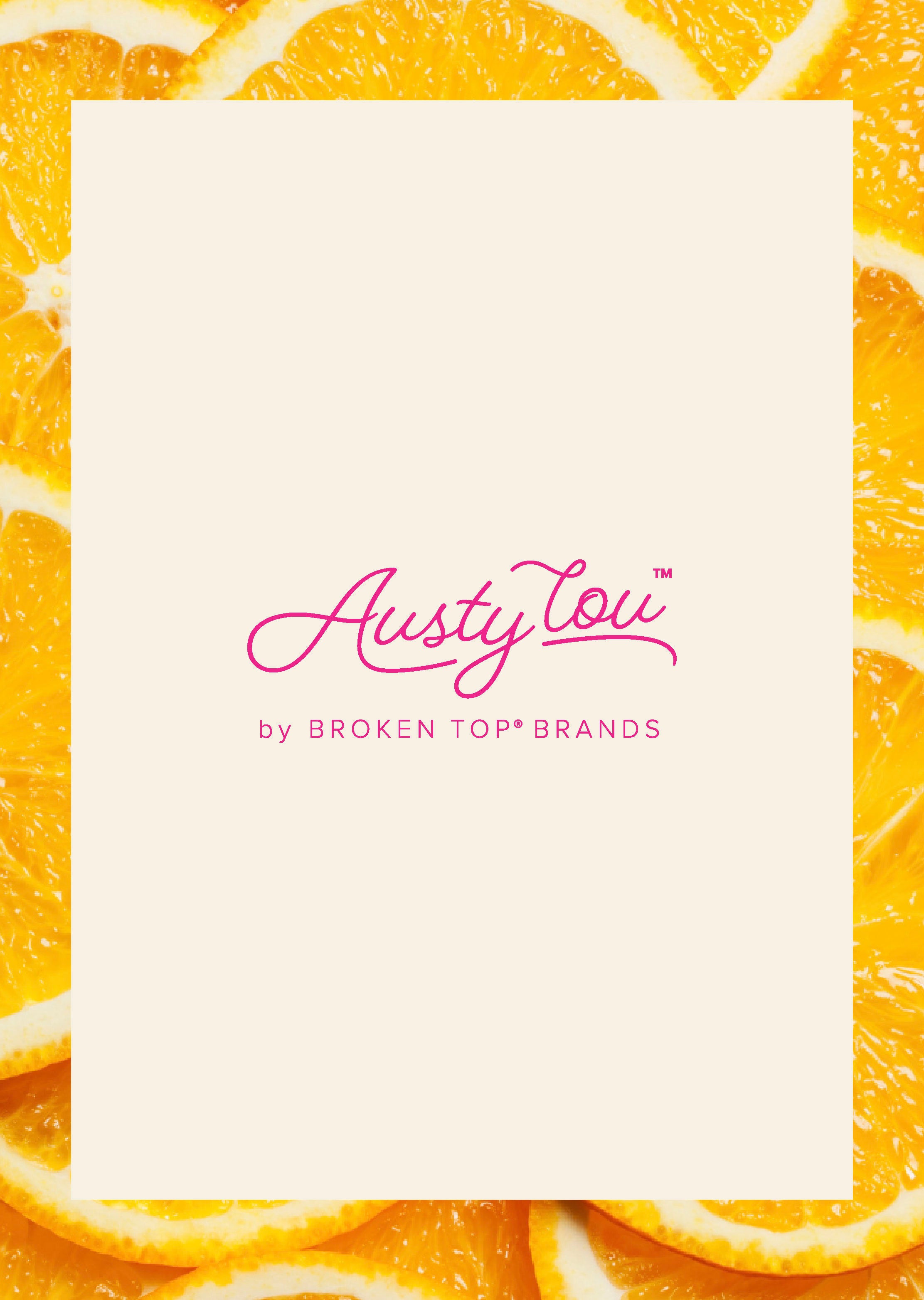Austy Lou by Broken Top Brands logo on a background of orange slices. 