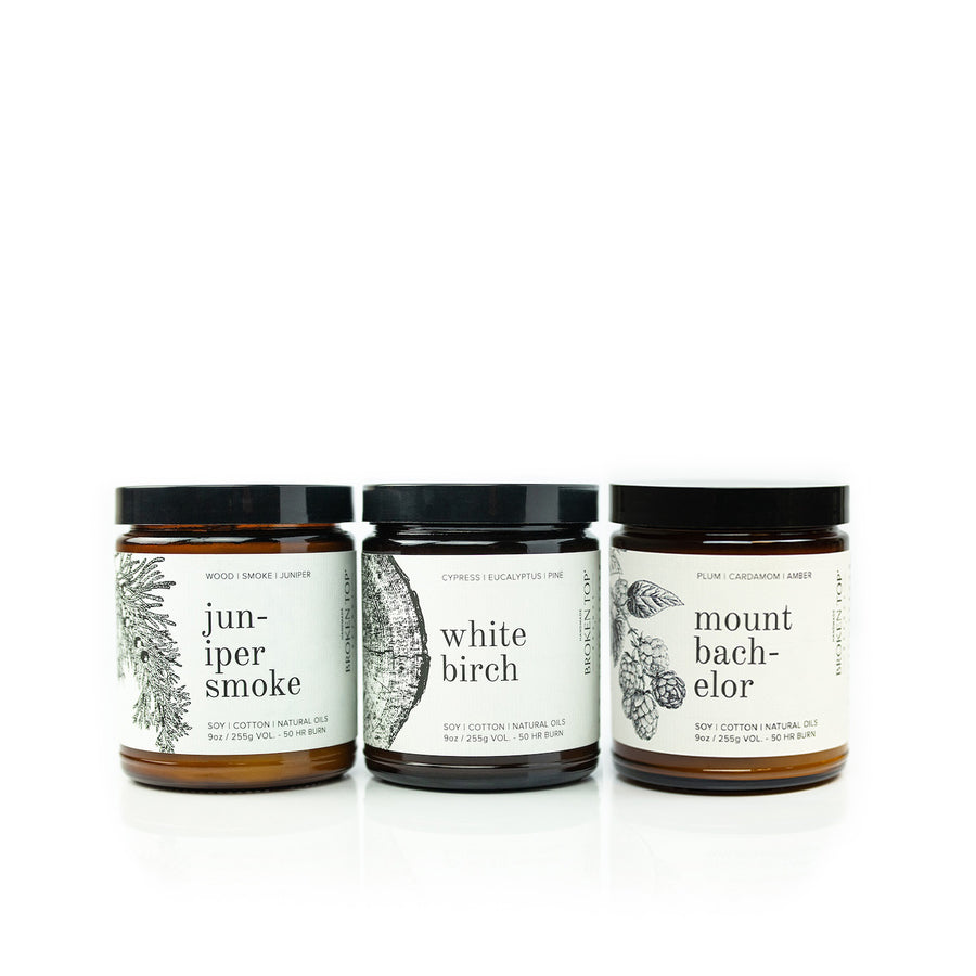 Juniper Smoke 9oz Soy Candle, White Birch 9oz Soy Candle and Mount Bachelor 9oz Soy Candle on white background. 