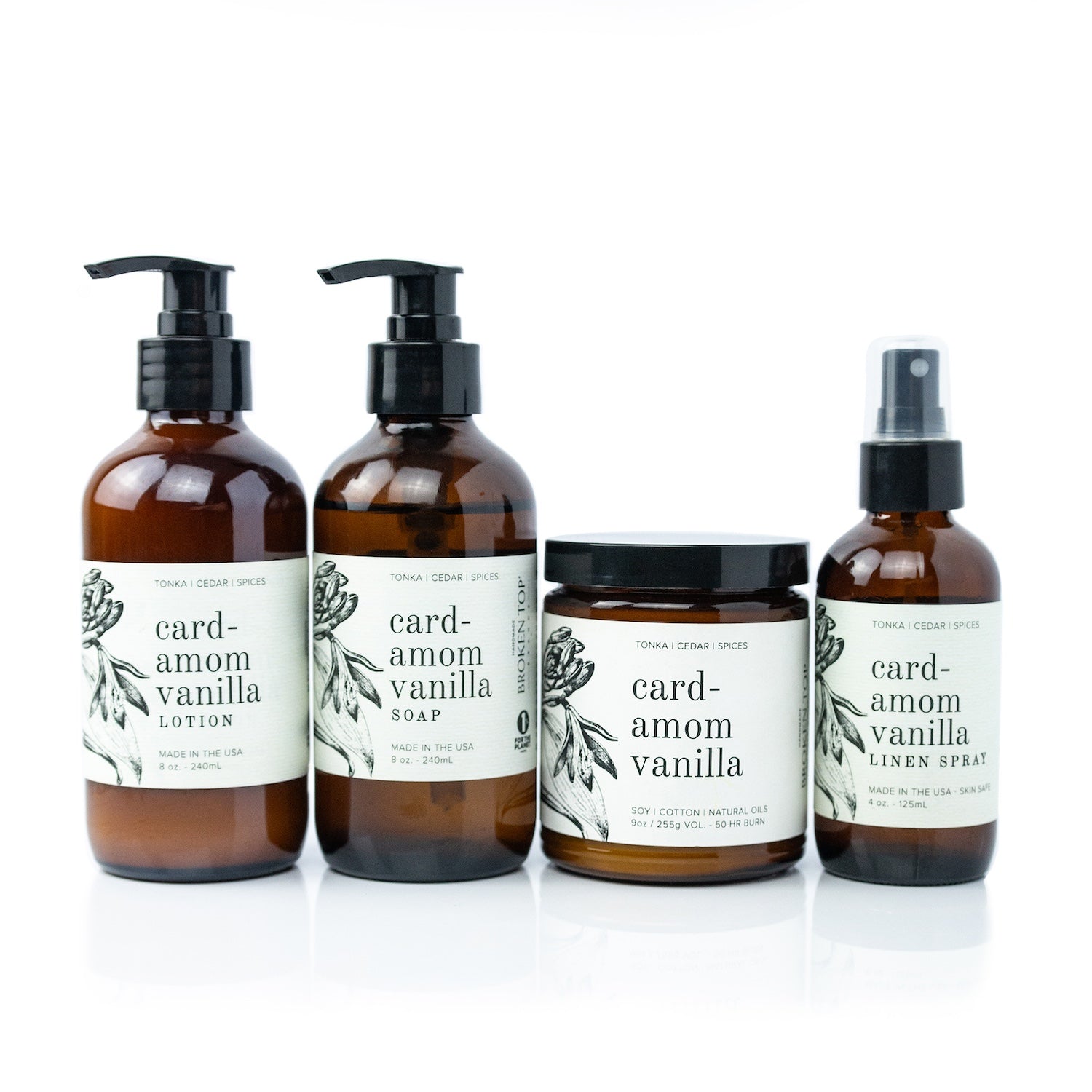 Cardamom Vanilla Bundle including 8oz Cardamom Vanilla Body Lotion, 8oz Cardamom Vanilla Liquid Soap, 9oz Cardamom Vanilla Soy Candle, and 4oz Cardamom Vanilla Linen Spray on white background. 