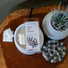 Coconut Pecan Wax Melts being used in a white wax melter. 