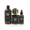 Sitka Woodland Bundle including 16oz Sitka Woodland Body Wash, Sitka Woodland Solid Cologne, 9oz Sitka Woodland Soy Candle, and 4oz Sitka Woodland Man Spray on white background. 