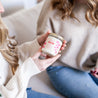 'In My Mom Era' 9oz Soy Candle being held by woman's hands. 