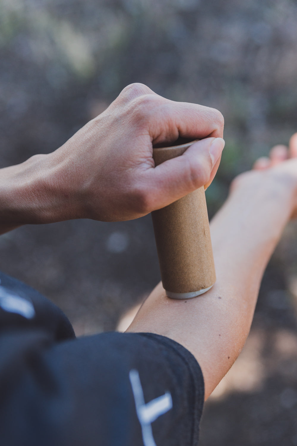 Lemon Citronella Repellent Stick being applied to inner arm. 