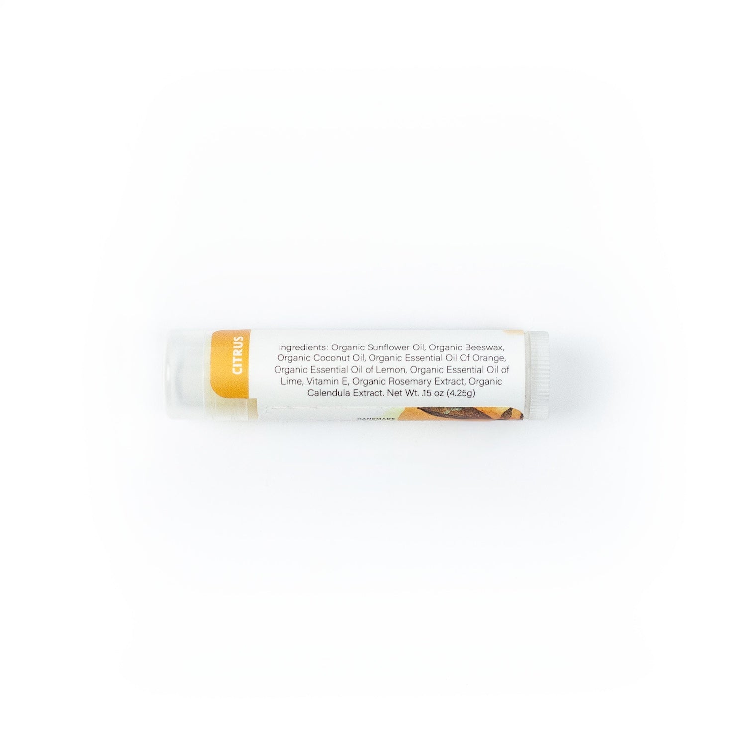 Citrus Lip Balm showing ingredients panel on white background. 