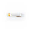 Citrus Lip Balm showing ingredients panel on white background. 