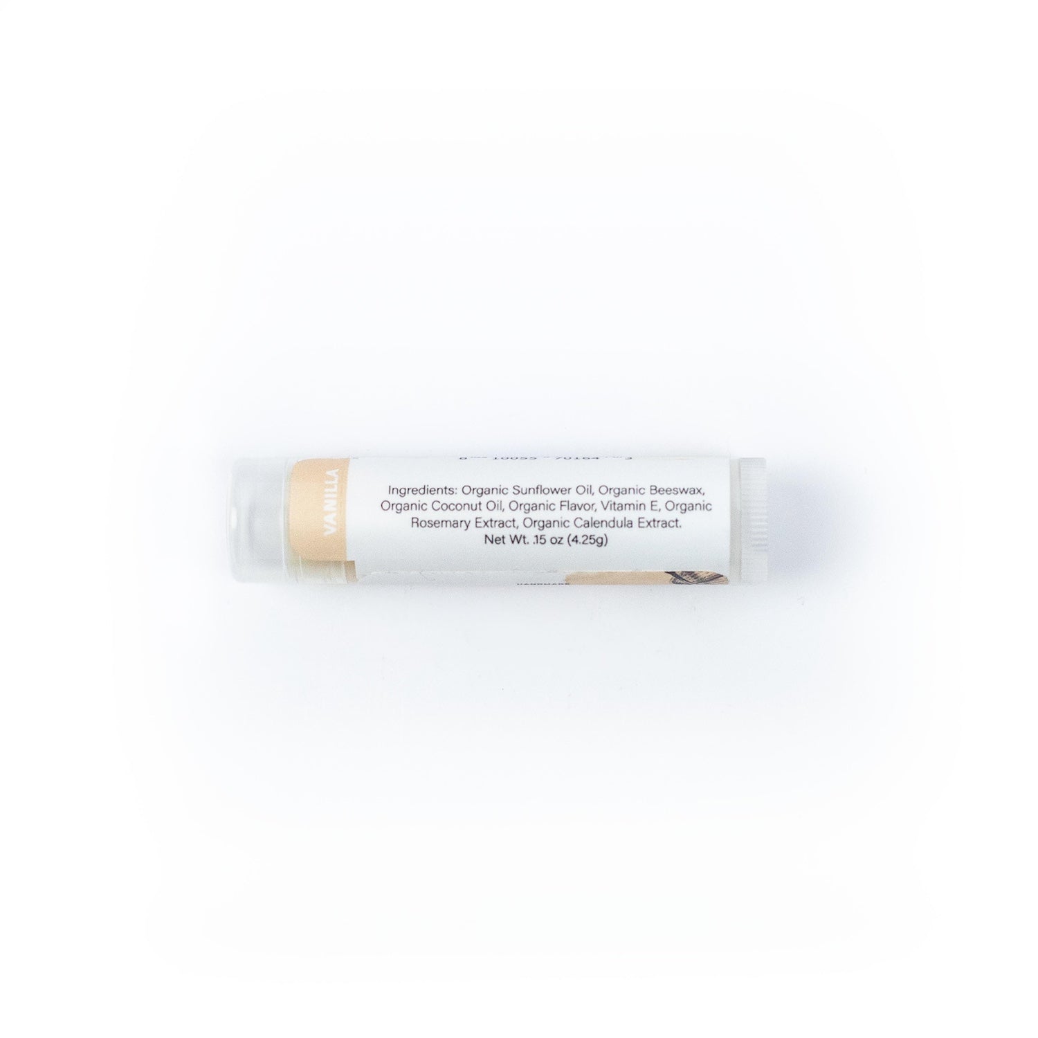 Vanilla Lip Balm showing ingredients panel on white background. 