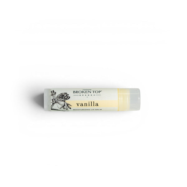 A tube of Vanilla Lip Balm on a white background. 