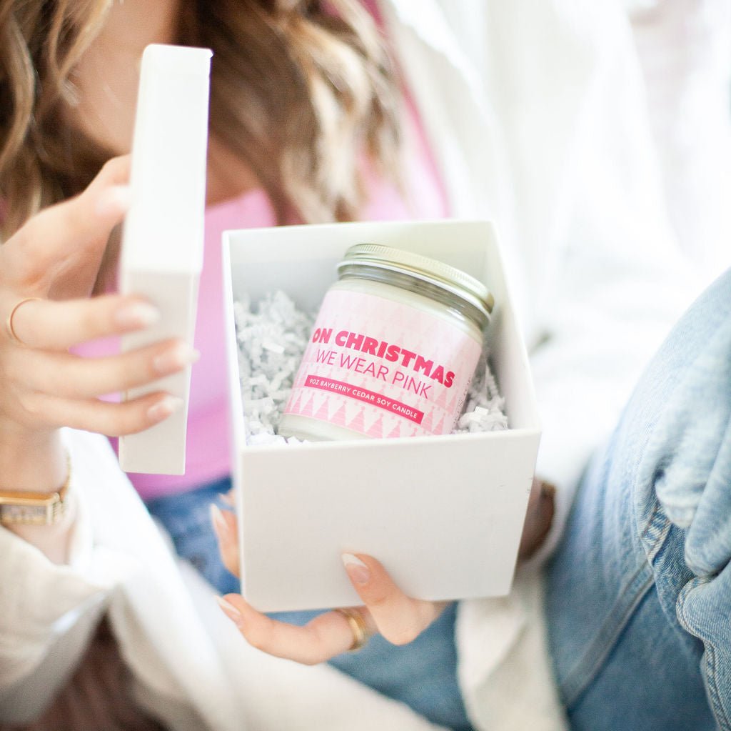 'On Christmas We Wear Pink' 9oz Soy Candle in a white gift box. 