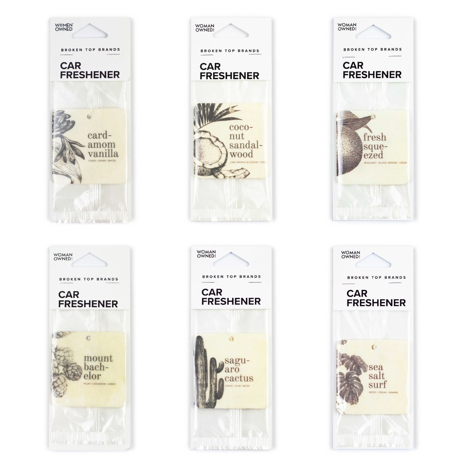 Cardamom Vanilla, Coconut Sandalwood, Fresh Squeezed, Mount Bachelor, Saguaro Cactus, and Sea Salt Surf Car Fresheners on white background. 