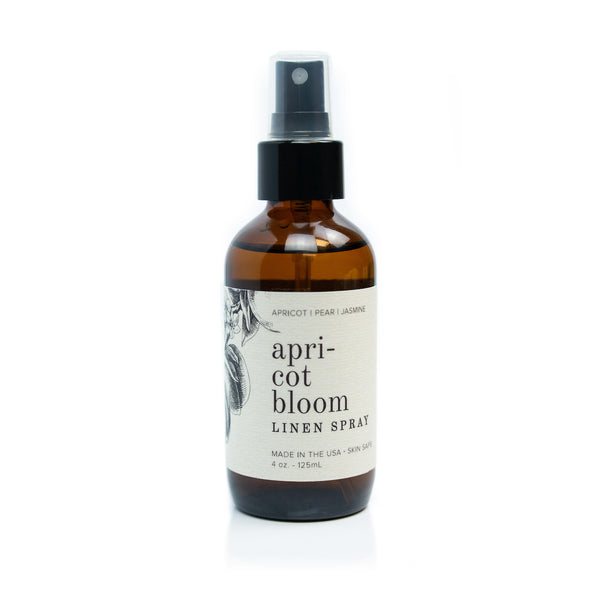 4oz Apricot Bloom Linen Spray on white background. 