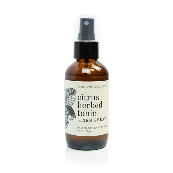 4oz Citrus Herbed Tonic Linen Spray on white background.