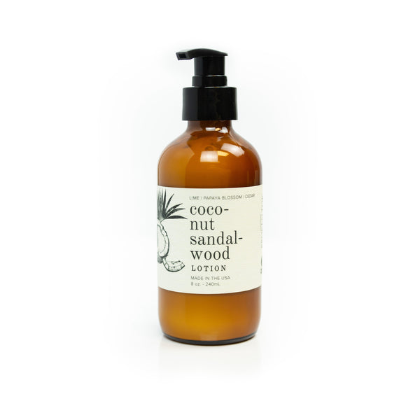 8oz Coconut Sandalwood Body Lotion on white background. 