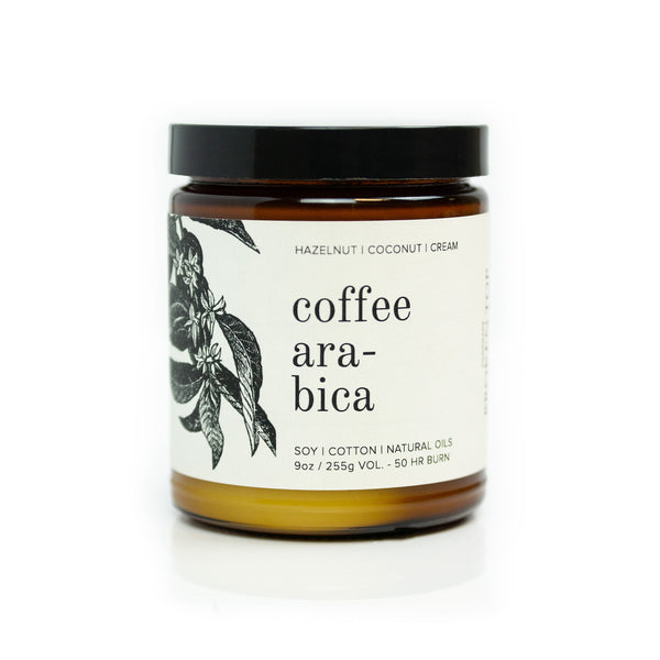 9oz Coconut Sandalwood Soy Candle on white background. 