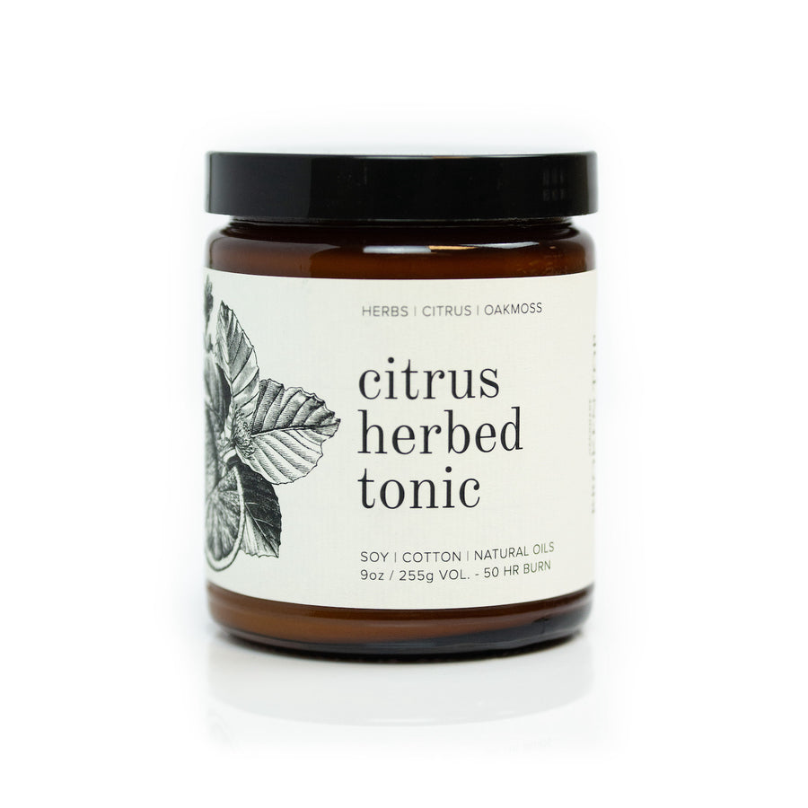 9oz Citrus Herbed Tonic Soy Candle on white background. 