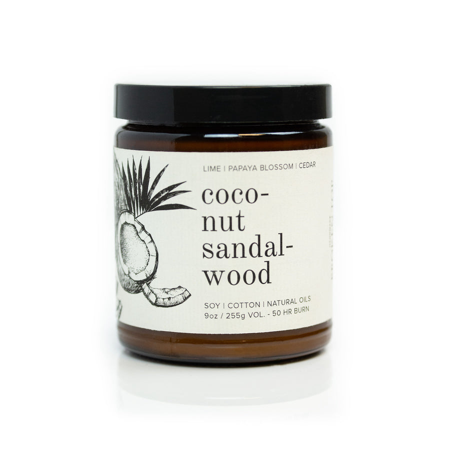 9oz Coconut Sandalwood Soy Candle on white background. 