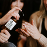 8oz Saguaro Cactus Body Lotion being dispensed into two hands. 